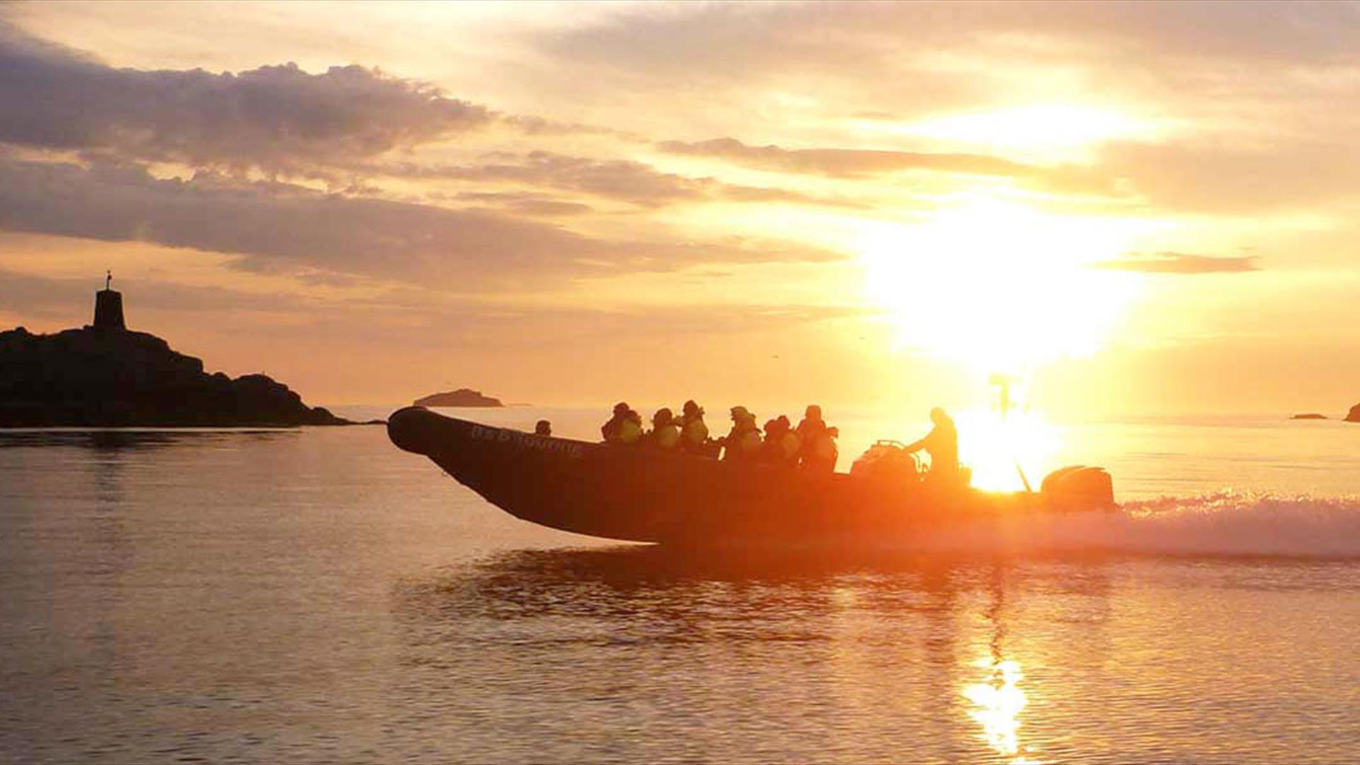 Speed Boat cruising in Harstad archipelago in midnight sun